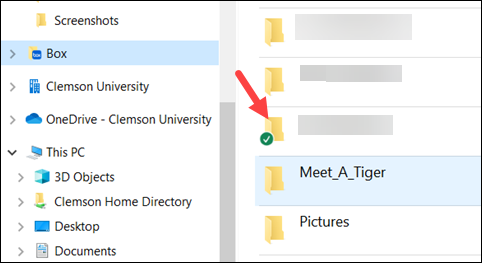 Arrow to folder with green checkmark